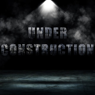 Text wording Under Construction in dark room with smoke and lighting effect.
